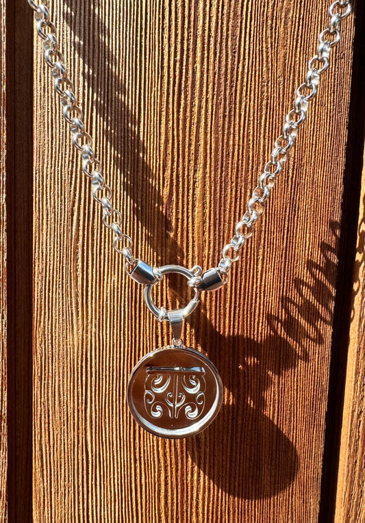 Moko Kauae Coin Necklace - Silver