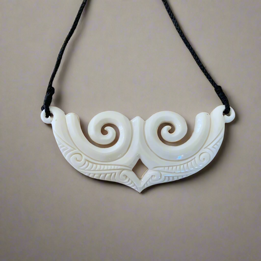 Bone - Double koru breast plate