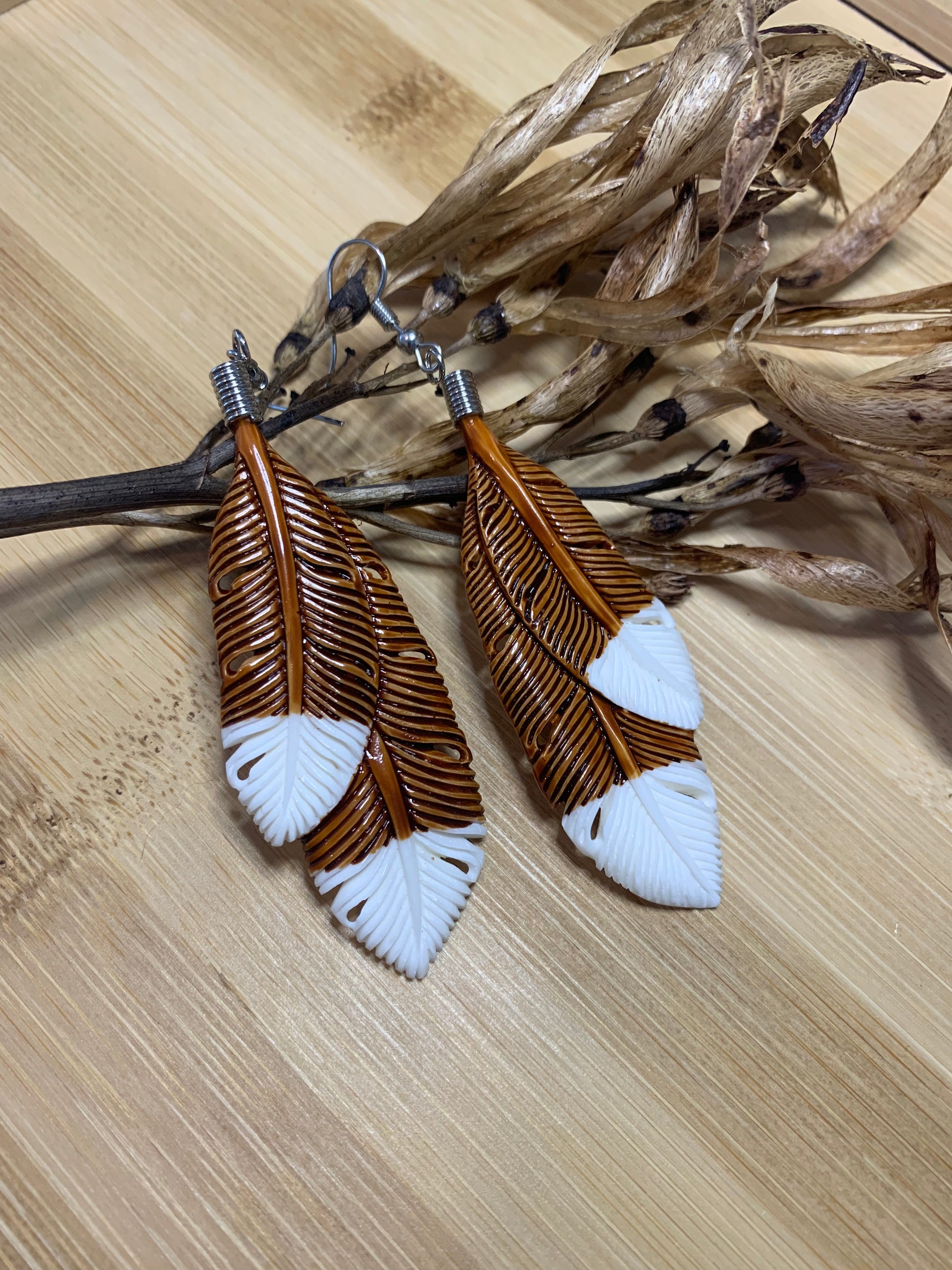 Bone feather earrings deals